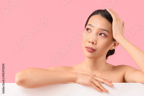 Beautiful Asian woman on pi...