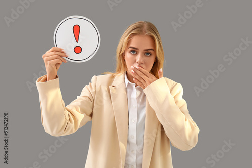 Young businesswoman holding...