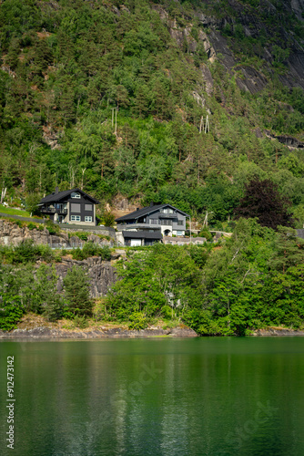 small house on the river in mountains