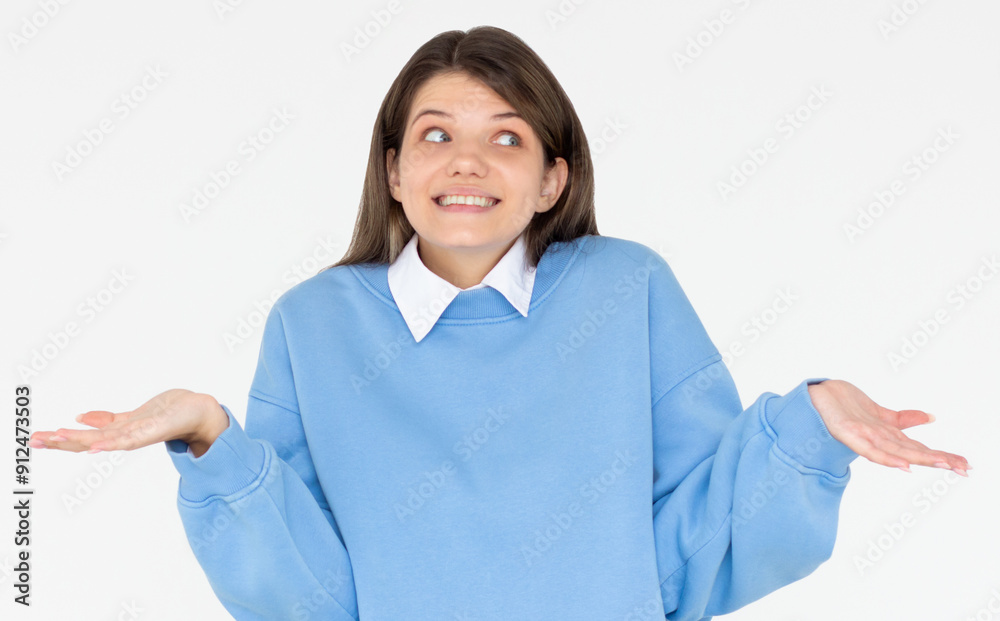 Confused thoughtful confused brunette young woman holding copy space on palm over white background Confused thoughtful confused brunette young woman holding copy space on palm over white background