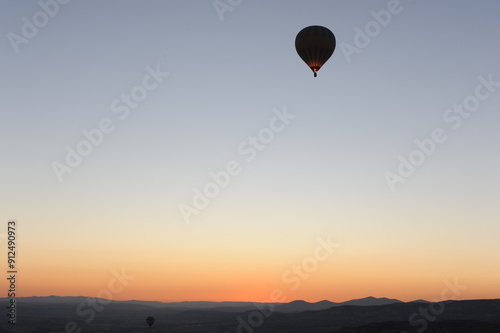 Hot air balloons at sunrise in Cappadocia, Türkiye (Turkey)