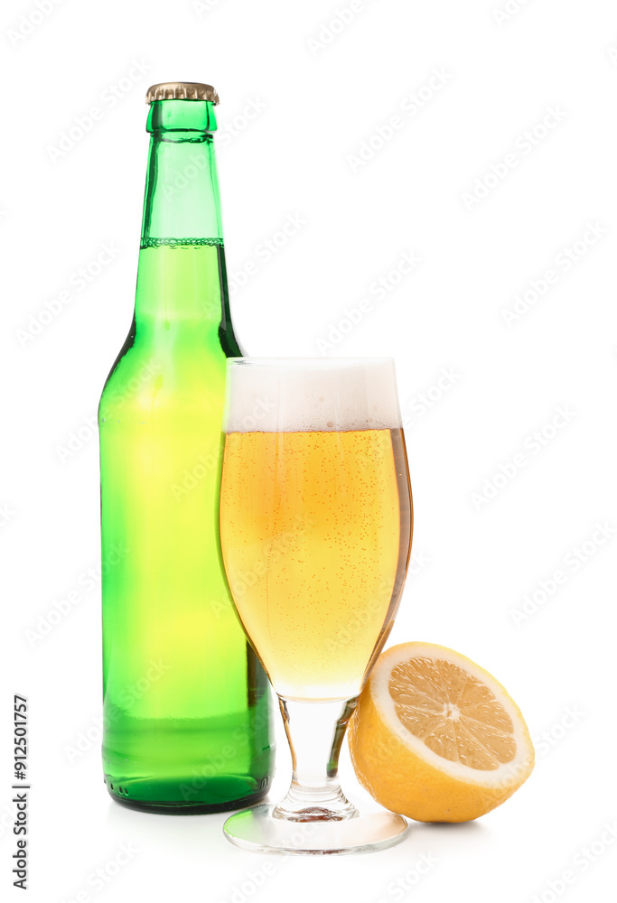 Bottle and glass of fresh light beer with lemon on white background Bottle and glass of fresh light beer with lemon on white background