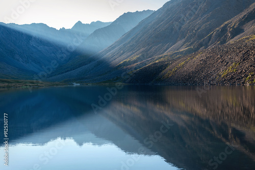 mountains lake reflection sunlight morning