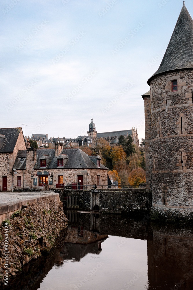 Naklejka premium Vertical view of Fougeres Castle and the nearby medieval buildings in Fougeres, France