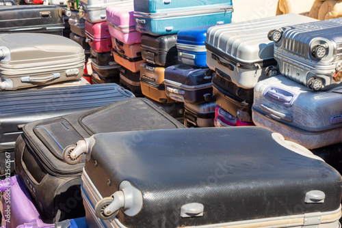 lost and found luggage suitcases and bags, during air travel lots of baggage is lost, complaints and liability photo