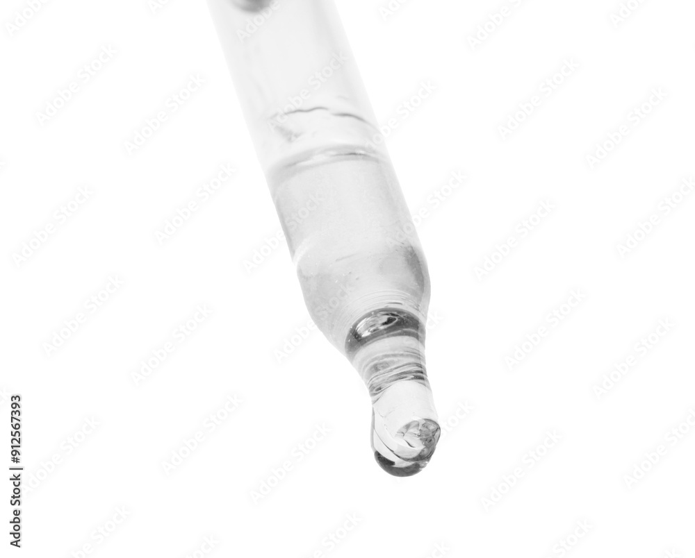 Dropper with clear cosmetic oil on white background