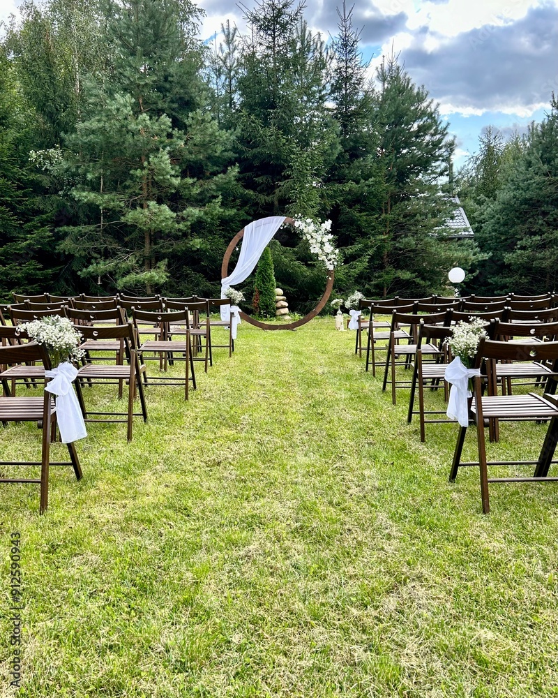 wedding arch and chairs for guests for outdoor marriage registration, wedding reception concept
wedding arch and chairs for guests for outdoor marriage registration, wedding reception concept