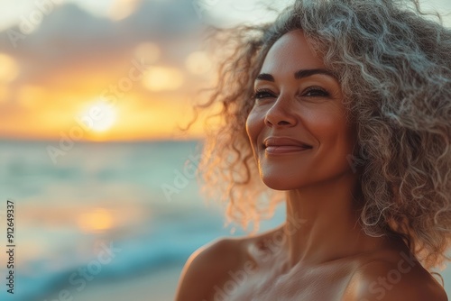 aigenerated beach scene mature woman with joyful expression golden hour lighting soft focus background realistic textures warm color palette serene atmosphere