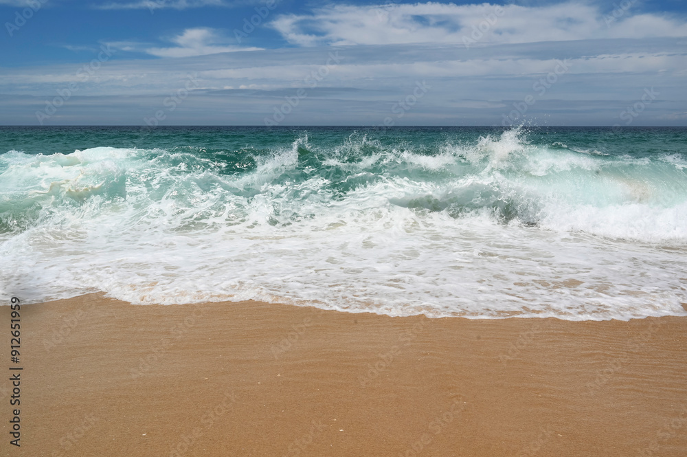 Summer surf waves on the sand beach at atlantic sea. Coast with splash water seaside seascape. Summer surf waves on the sand beach at atlantic sea. Coast with splash water seaside seascape.