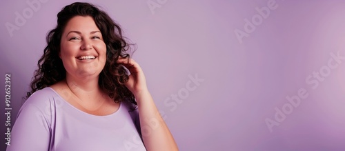 Happiness. Cheerful plump woman laughing and posing standing on purple studio background. Self-love and body positivity concept.