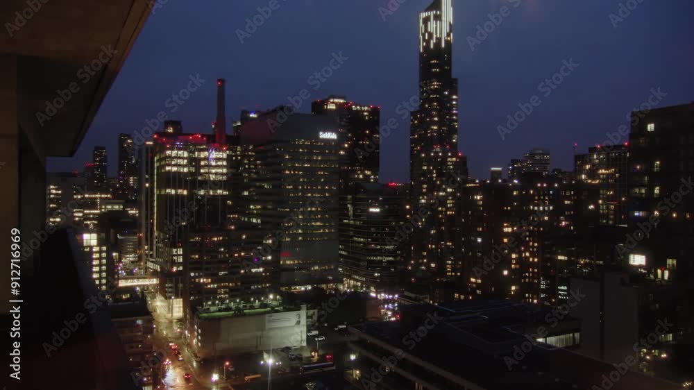 Breathtaking aerial view of Toronto at night, highlighting the city illuminated skyscrapers and the lively streets below. Canada, North America. Breathtaking aerial view of Toronto at night, highlighting the city illuminated skyscrapers and the lively streets below. Canada, North America.