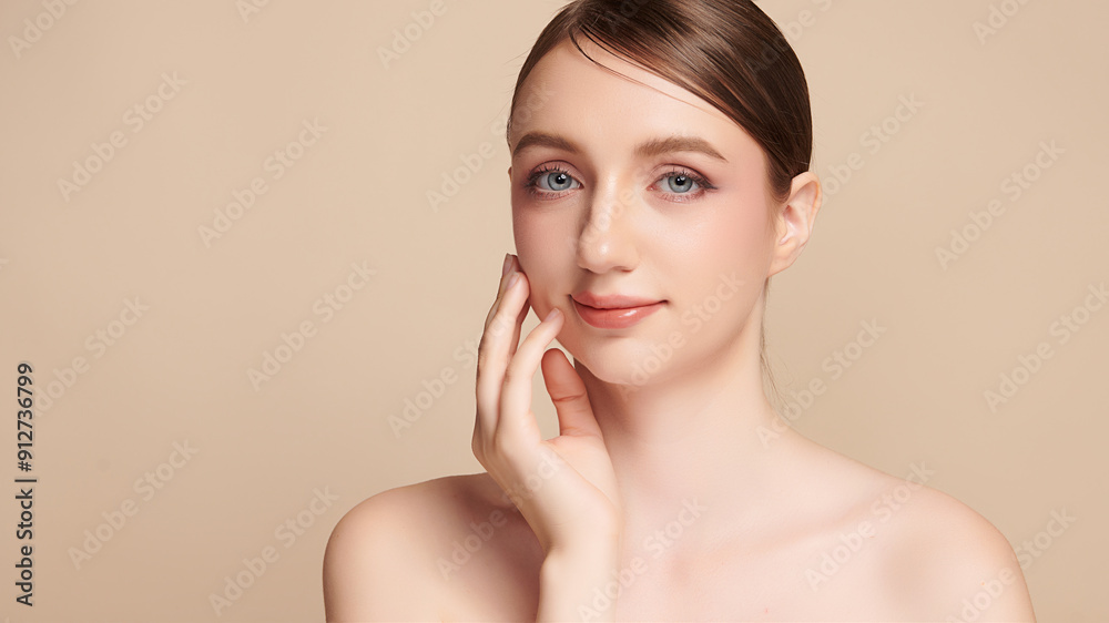 Beautiful young woman with clean fresh skin on beige background, Face care, Facial treatment, Cosmetology, beauty and spa, women portrait. Beautiful young woman with clean fresh skin on beige background, Face care, Facial treatment, Cosmetology, beauty and spa, women portrait.