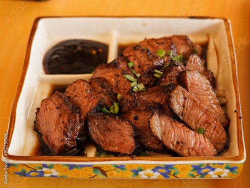 Фотография high-quality beef steak with special sauce