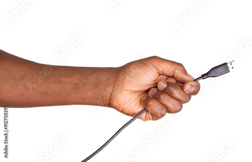 Male hand holding an usb cable, isolated on white or transparent background