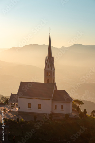 Pôr do Sol no Morro Boa Vista com a vista das montanhas e Chiesetta Alpina, Jaraguá do Sul, Santa Catarina photo