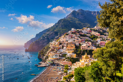 Fototapeta Naklejka Na Ścianę i Meble -  View of Positano with comfortable beach and blue sea on Amalfi Coast in Campania, Italy. Positano village on the Amalfi Coast, Salerno, Campania. Beautiful Positano, Amalfi Coast in Campania.