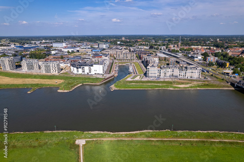 Aerial wide panoramic view on recreational port and Kade Zuid construction site of the new Noorderhaven neighbourhood along the river IJssel in Zutphen, The Netherlands photo