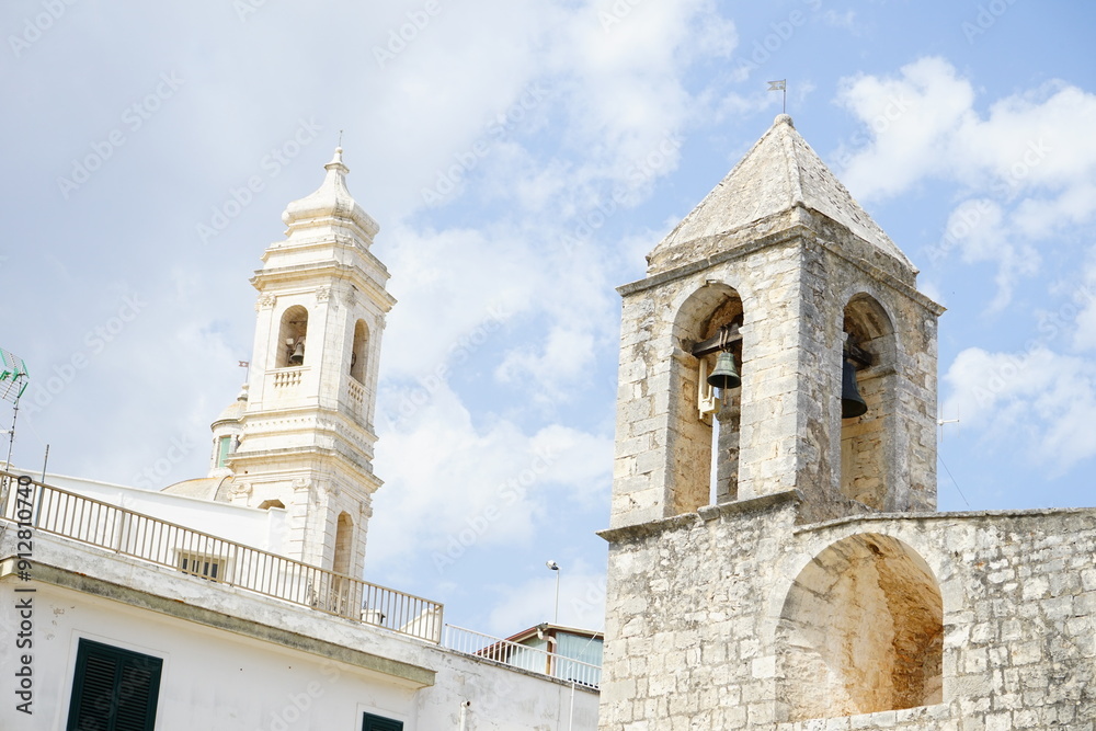 Towers of Locorotondo cathedral, Puglia, Italy Towers of Locorotondo cathedral, Puglia, Italy