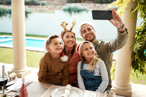 Family, happy and selfie for Christmas, bonding and joy outdoor with fun, smile and pool in backyard. Mom, dad and children for holiday, celebration and social media with support, memory and embrace photo