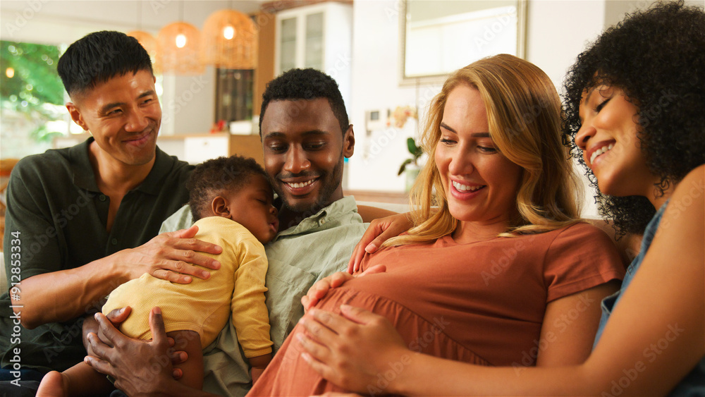 Group of Friends Enjoys Quality Time Together With Newborn and Expectant Mother in Cozy Living Room Group of Friends Enjoys Quality Time Together With Newborn and Expectant Mother in Cozy Living Room