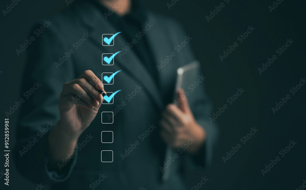 © Worranan - Business performance checklist concept Young business woman using laptop surveys online checklist Complete the digital form checklist via the internet.. © Worranan - Business performance checklist concept Young business woman using laptop surveys online checklist Complete the digital form checklist via the internet..