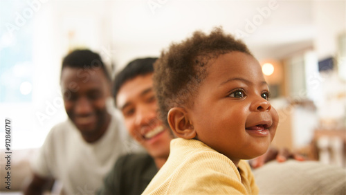 Slika na platnu Joyful Family Gathering With Baby Smiling At Home In The Afternoon
