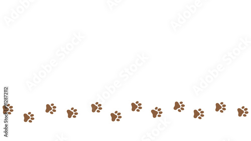 Trail of dog or cat paw prints on a white background. . Steps tracing the path. Copy space background with pet foot. Animal or pet theme seamless pattern backdrop.