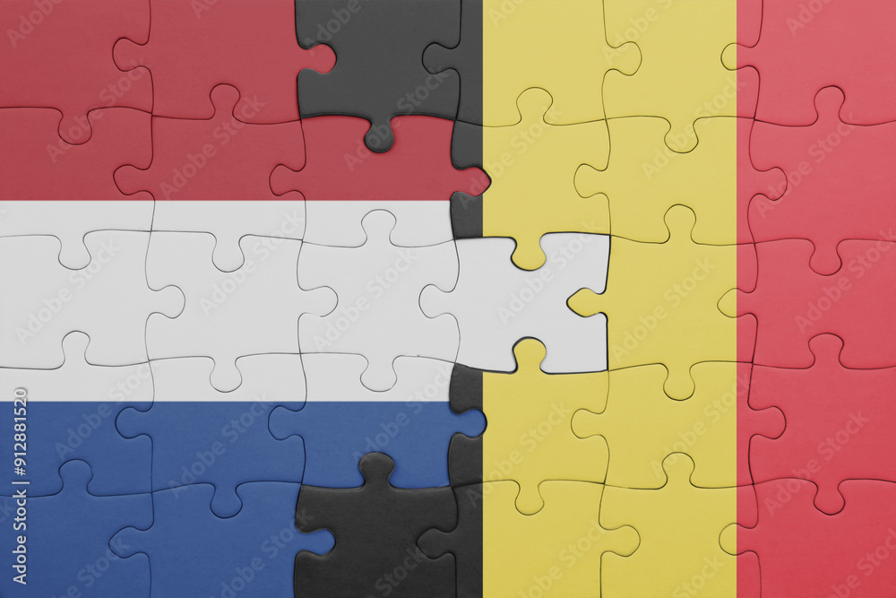 puzzle with the colourful national flag of belgium and flag of netherlands. puzzle with the colourful national flag of belgium and flag of netherlands.