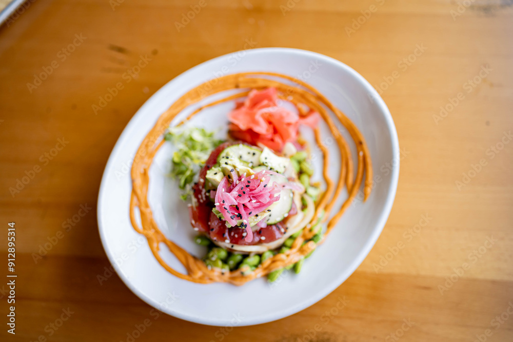 Tuna Poke Rice tower at gourmet beachfront restaurant Tuna Poke Rice tower at gourmet beachfront restaurant