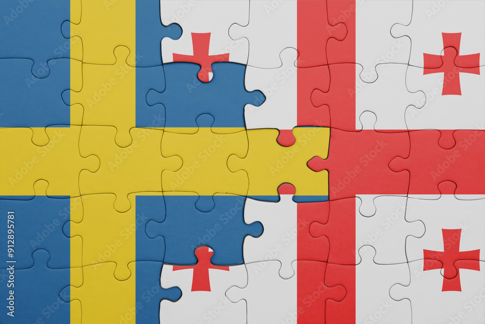 puzzle with the colourful national flag of georgia and flag of sweden. puzzle with the colourful national flag of georgia and flag of sweden.