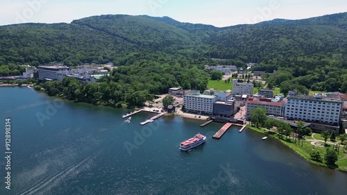 Wallpaper Mural Lake Akan, Japan: Aerial drone footage of the Akano Onsen resort town by lake Akan in the Akan-Mashu National Park in Hokkaido in summer in Japan.  Torontodigital.ca