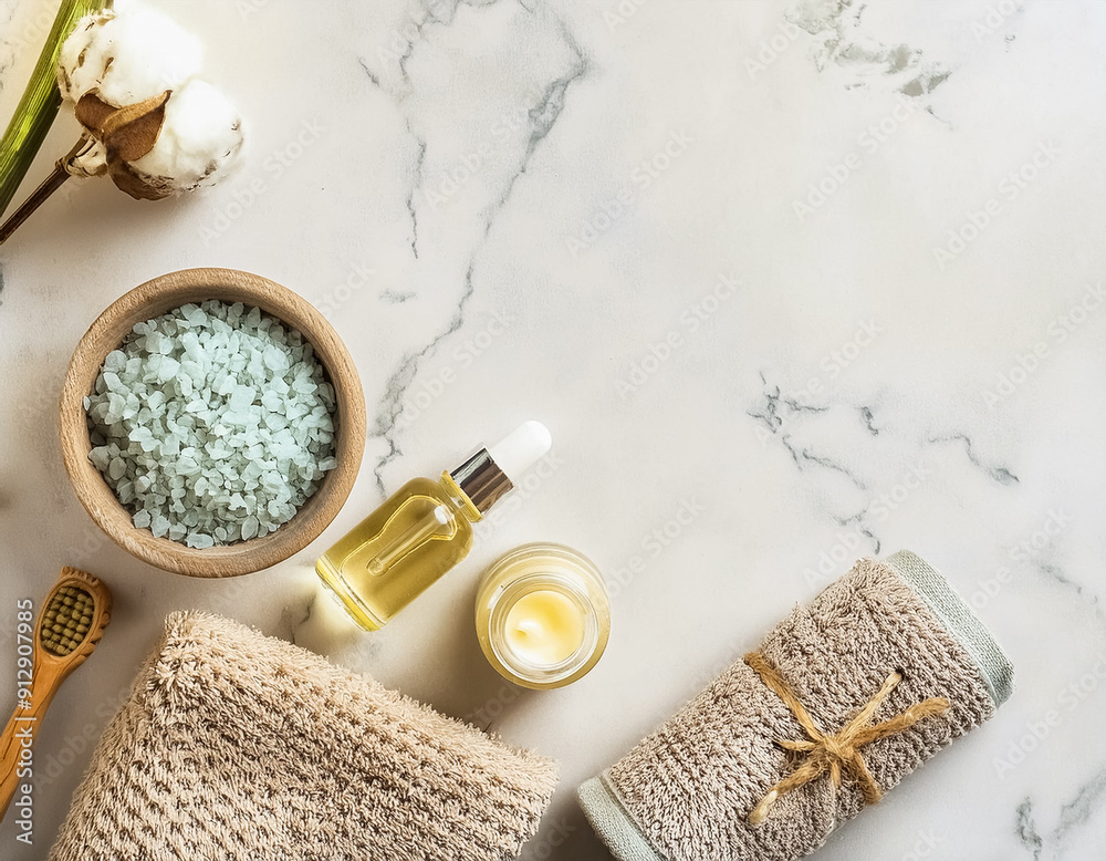 Luxurious Spa Beauty Products and Tools Displayed on White Marble Background with Ample Copyspace Luxurious Spa Beauty Products and Tools Displayed on White Marble Background with Ample Copyspace