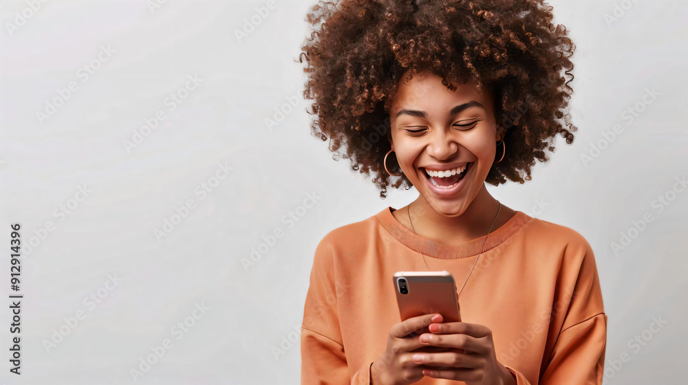 Happy Woman Using Smartphone and Laughing.
