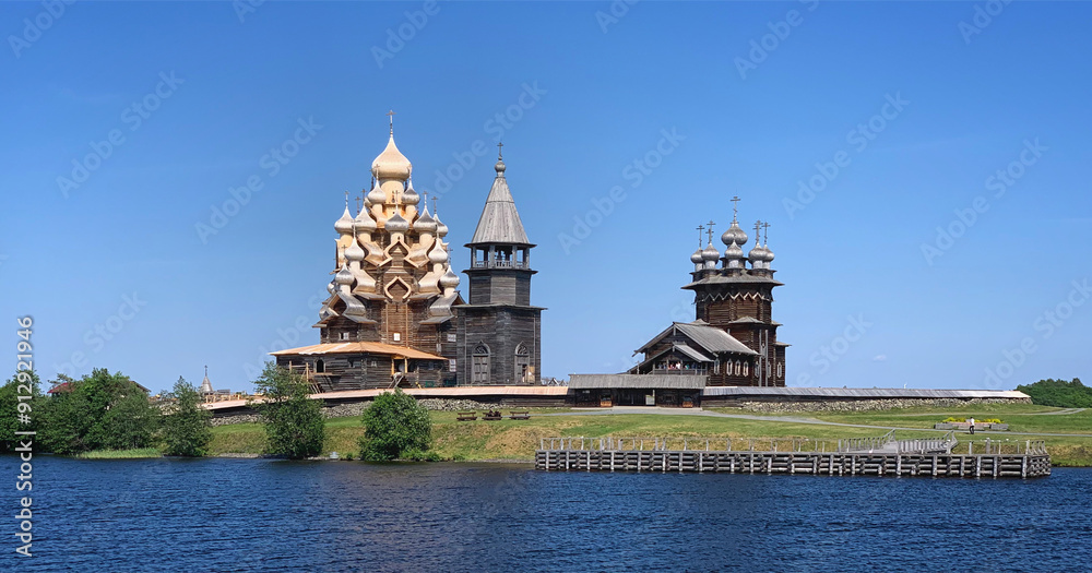 Fototapeta premium View of The Church of the Transfiguration, The Church of the Intercession and Belfry of the Kizhi Pogost, Karelia, Russia, June 2019