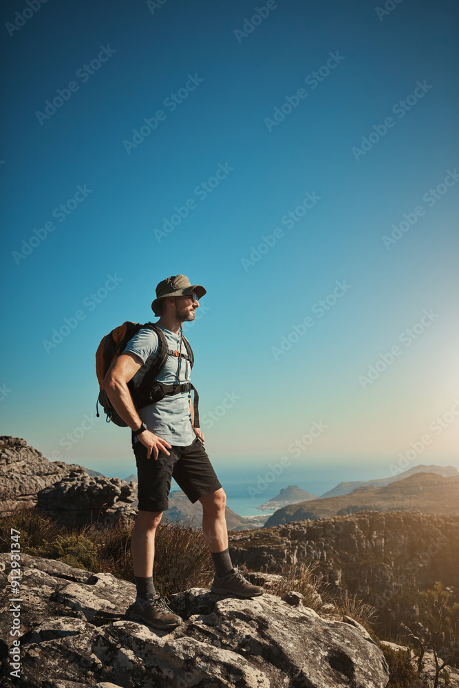 Fototapeta premium Man, hiking and mountain on peak outdoor for fitness travel, adventure view and backpack journey in summer. Male hiker, backpacking and trekking sky mockup for cardio exercise of rock climbing health