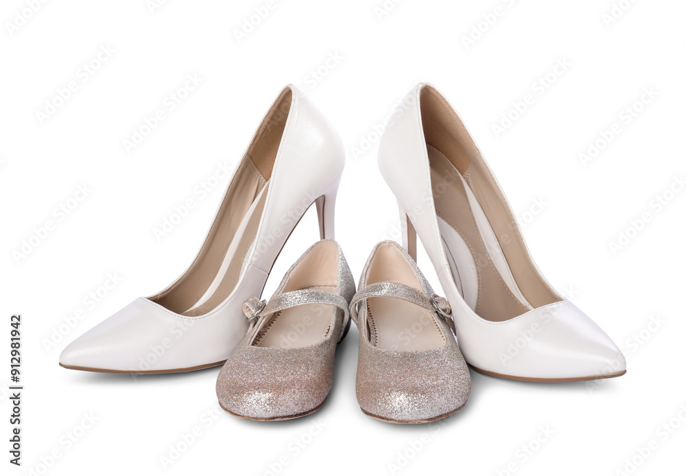 Big and small shoes isolated on white Big and small shoes isolated on white