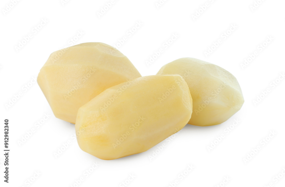 Peeled fresh raw potatoes isolated on white Peeled fresh raw potatoes isolated on white