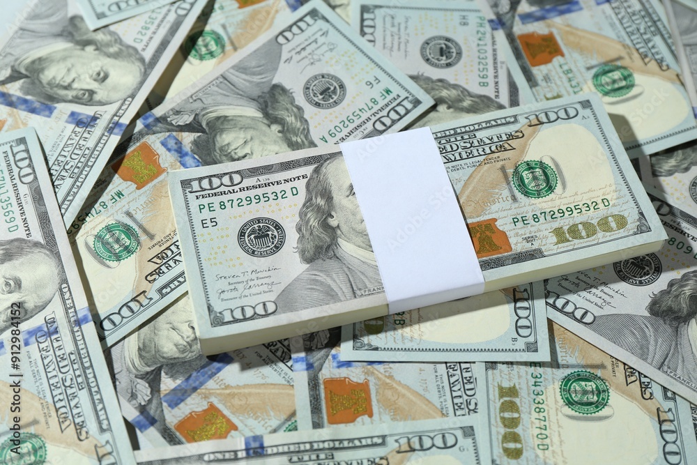 Many dollar banknotes as background, closeup view Many dollar banknotes as background, closeup view