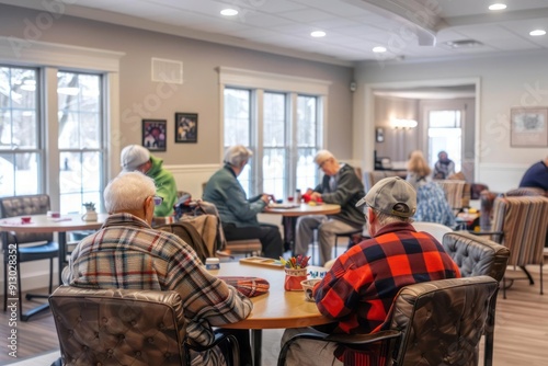 A group of seniors gathered in a common room at a retirement home, demand for social and healthcare services photo