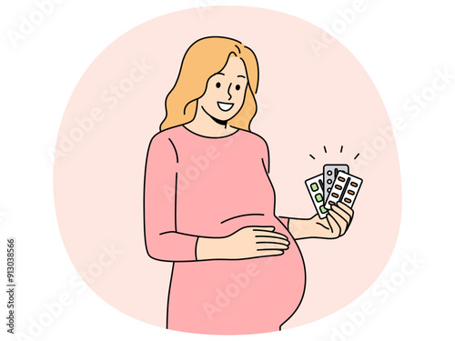 Pregnant woman holds blisters of pills and vitamins to support immunity of baby in womb. Pregnant expectant mother recommends taking useful medicines to get rid of health problems.