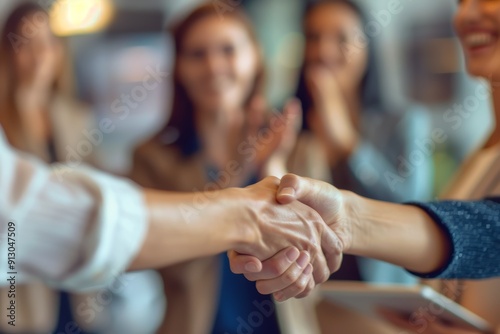 City businesspeople shake hands and applaud when collaborating. Shaking hands, pleased and group clapping in b2b relationship, startup acquisition celebration and congratulations