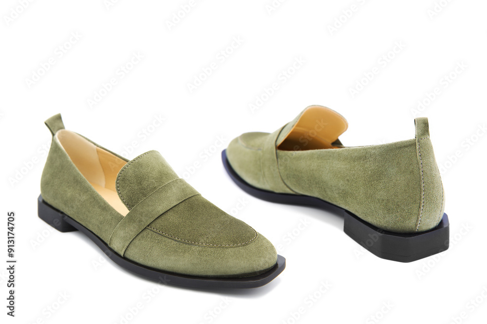 Pair of fashionable stylish suede leather loafer shoes isolated on white background. View from all sides. Pair of fashionable stylish suede leather loafer shoes isolated on white background. View from all sides.
