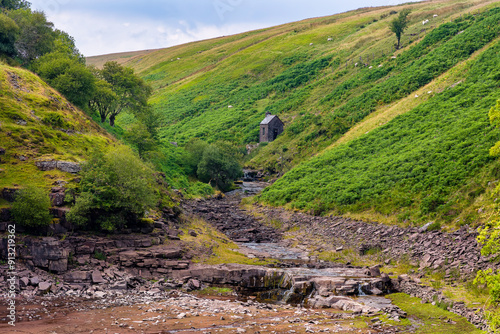 Small Bothy mountain shelter in a remote, upland area photo