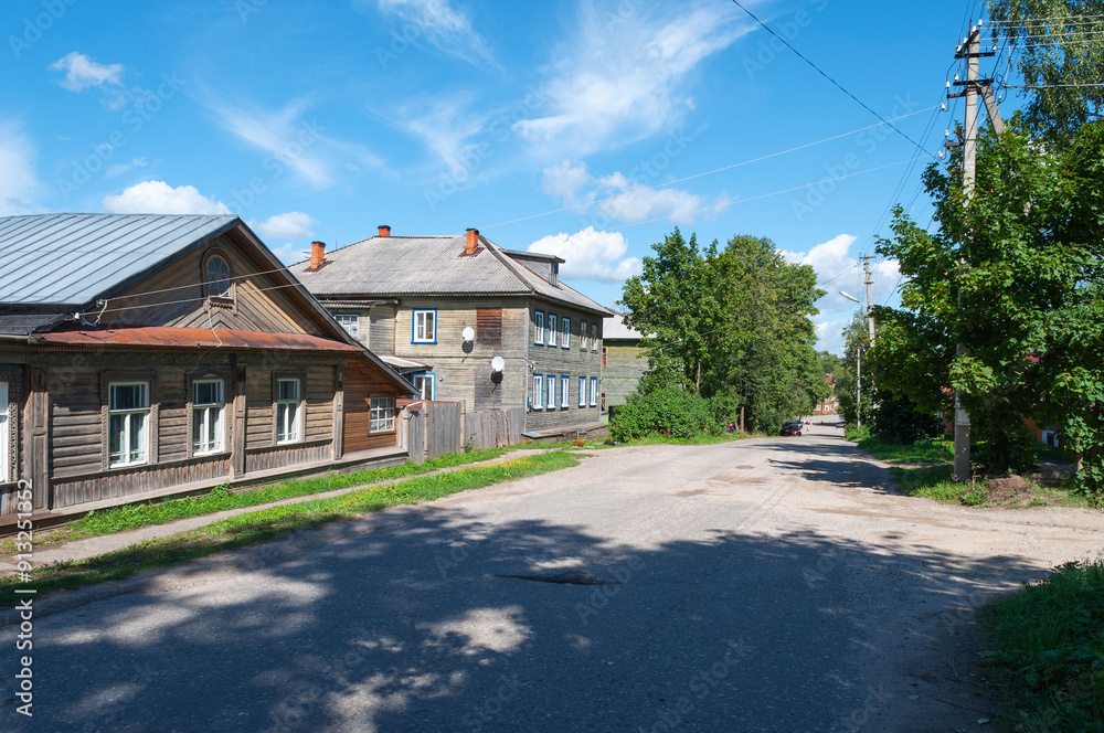 Traditional wooden houses on a street in the northern Russian town of Chukhloma Traditional wooden houses on a street in the northern Russian town of Chukhloma