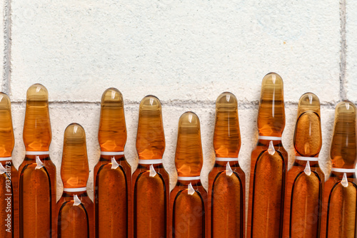 Medical ampoules with brown...