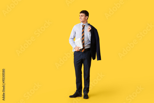 Smiling young man with styl...