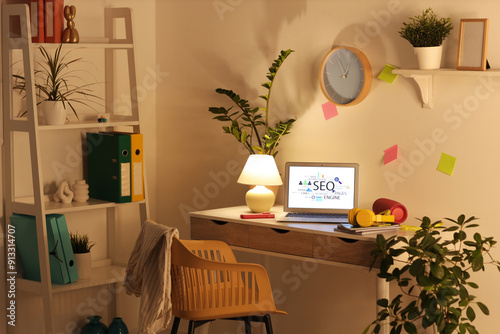 Workplace with modern lapto...