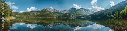Wallpaper Mural Tranquil mountain lake with crystal clear water reflecting forest and cliffs under a blue sky Torontodigital.ca