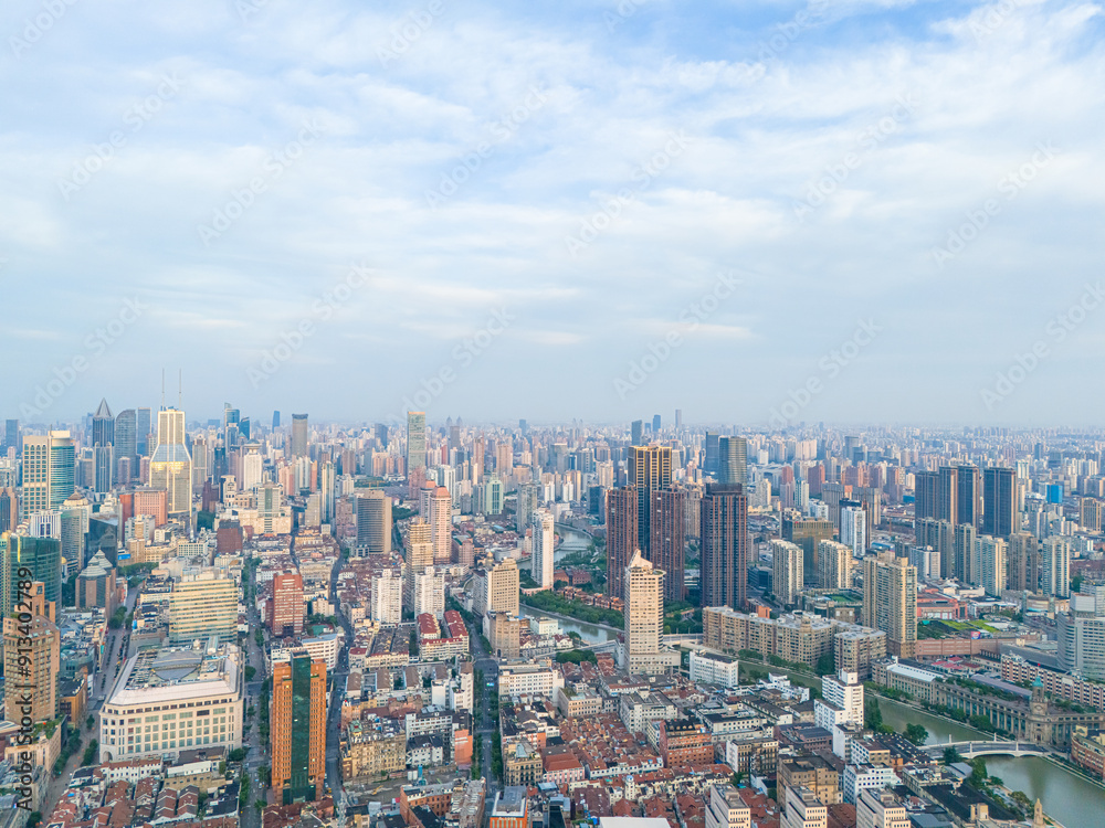 Fototapeta premium Aerial view of modern city skyline and buildings at sunrise in Shanghai