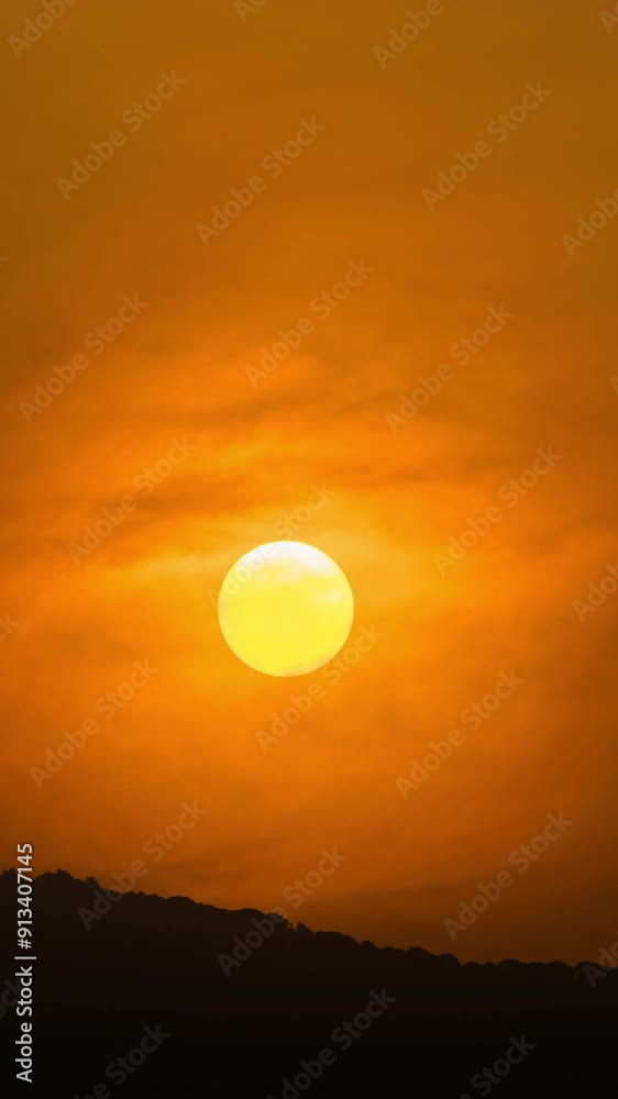 Timelapse of dramatic sunrise with orange sky in a cloudy day. Timelapse of dramatic sunrise with orange sky in a cloudy day.